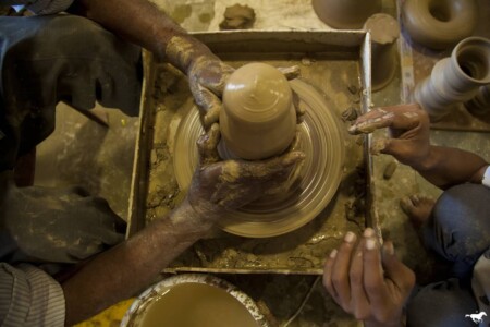 To each potter, his own throwing technique. Each piece, unpredictably unique.
Potter Haroun Budha here, visualising forms for Thomas.