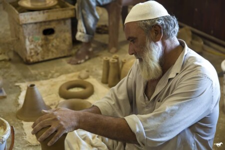 That's master craftsman Ramzu Kumbhar at the wheel. The only way to truly understand the intricacies of how Kachchhi clay is treated, molded, bisqued and fired, is by watching the potters at work .
Oral transmission rules. There is no documentation, we live in stories.